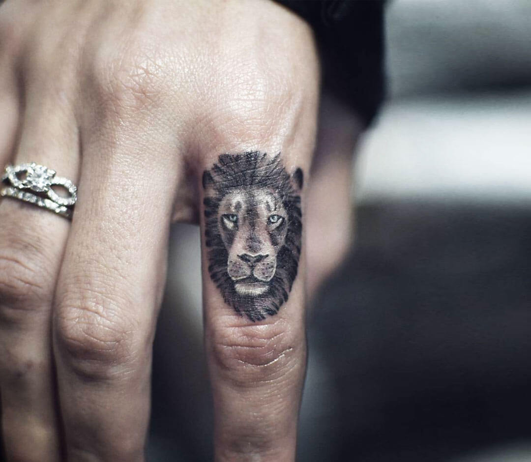 Micro Lion  Hand tattoos for guys Finger tattoos Finger tattoo for women
