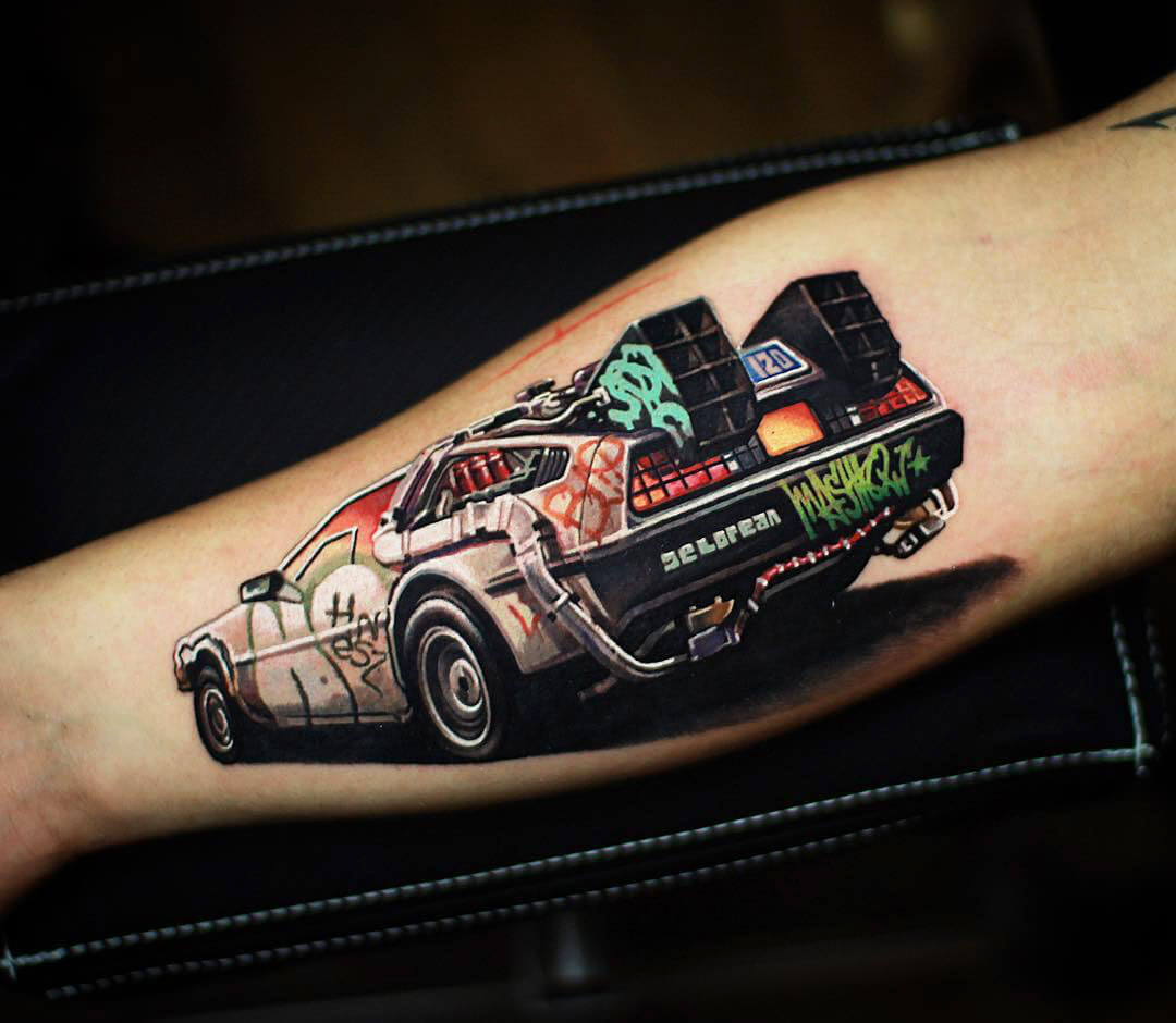 DeLorean tattoo by Mashkow Tattoo. 