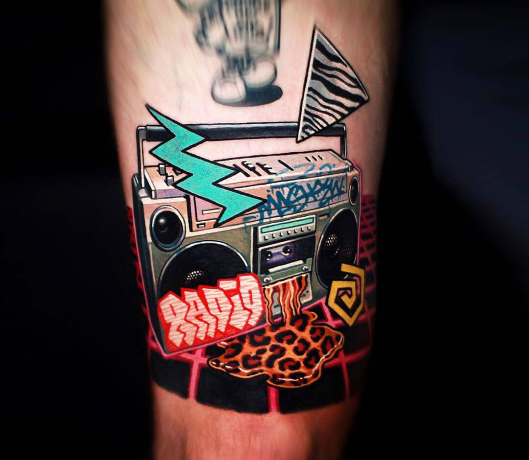 Cassette tape tattoo located on the forearm,