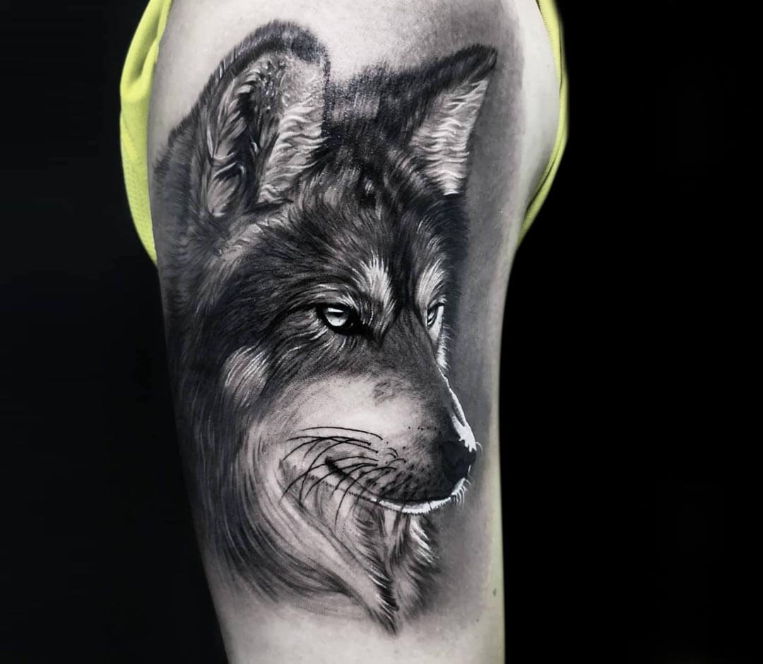 Realistic wolf head tattoo