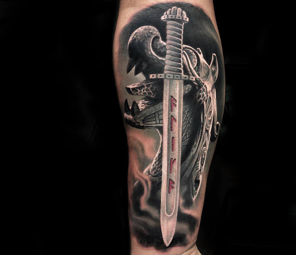 A crown and sword tattoo can be a powerful symbol of authority, strength,  and protection. . . . . . Tattoo by:-… | Instagram