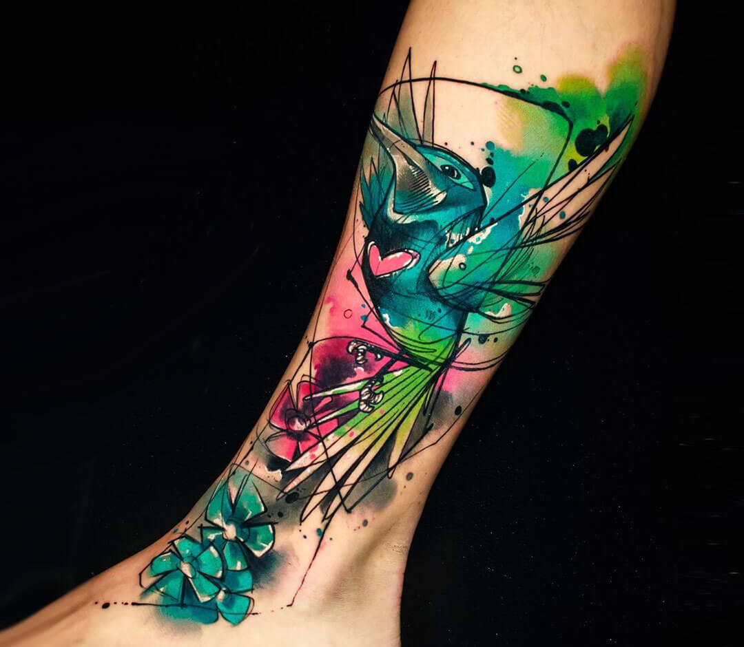 ankle hummingbird wrap around tattoo｜TikTok Search