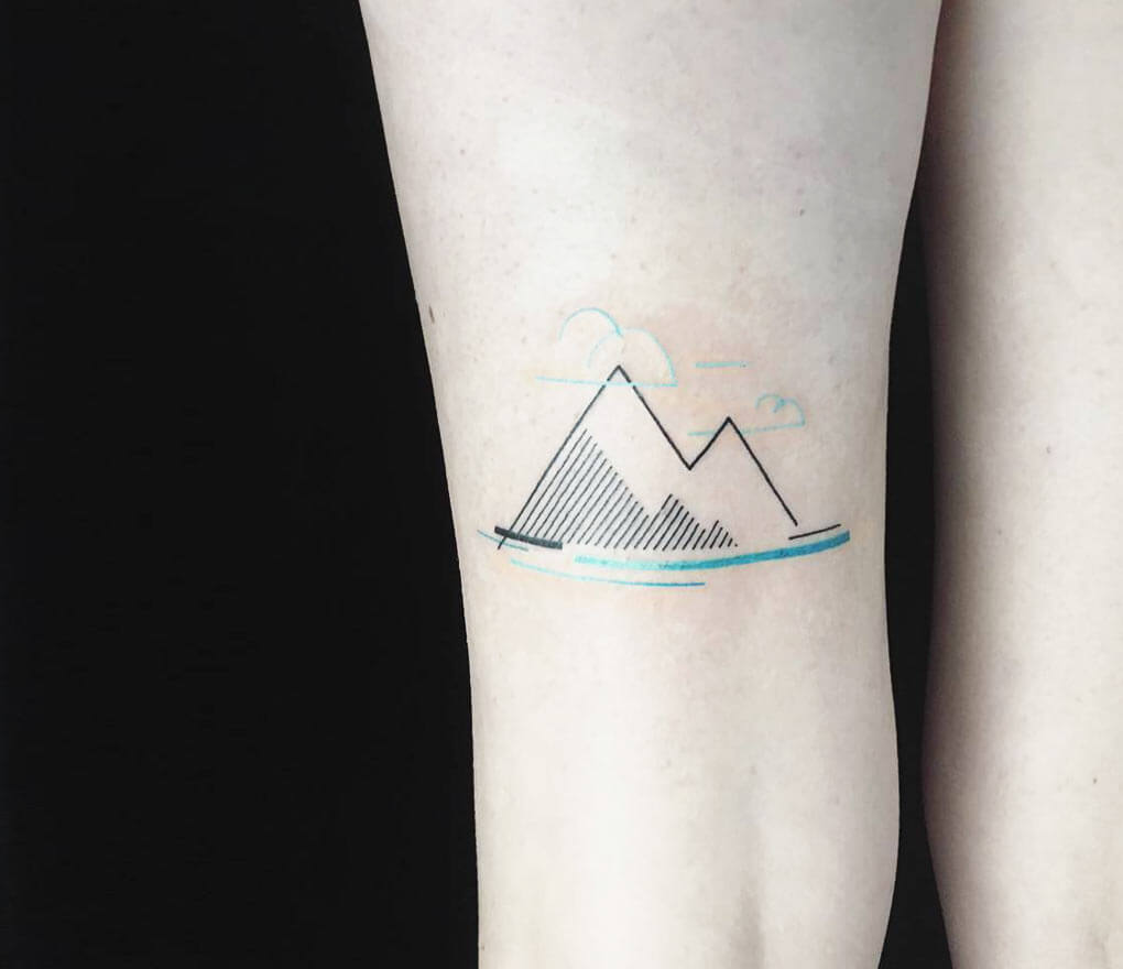 Kancha Tattoo Zone - There's a lot of meaning to glean from a minimalist  mountain tattoo. They are used to represent a no-frills approach to life.  They are also a symbol of
