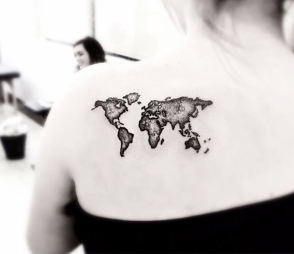 Minimalist black and white tattoo of a map on a person's back on Craiyon