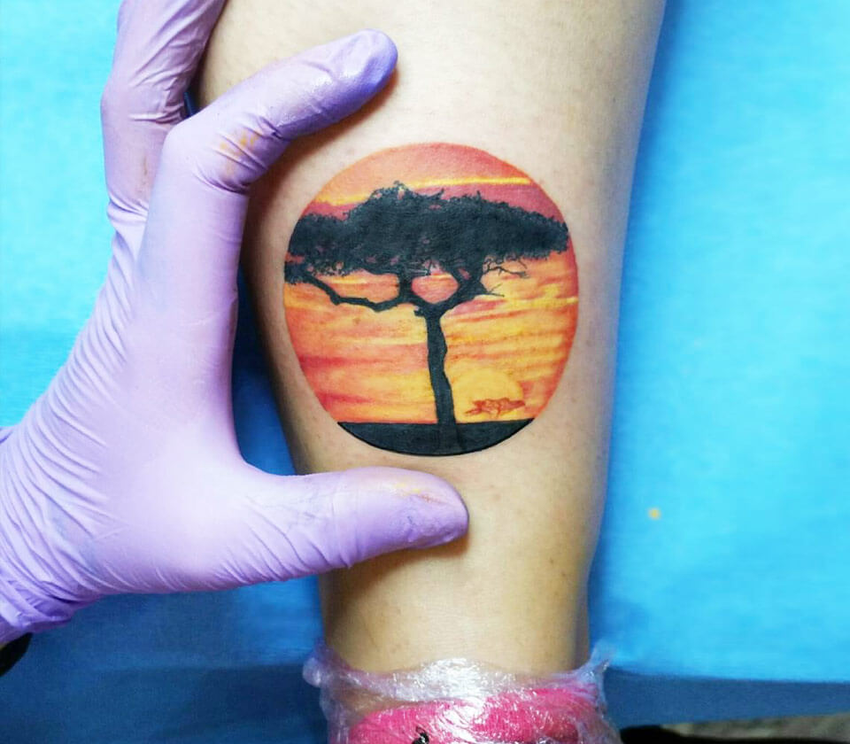Close. realistic africa sunset realistic tattoo art Andrea Morales. 