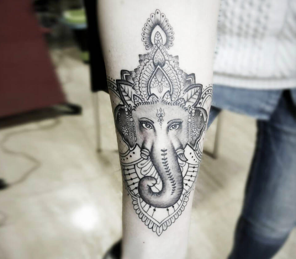 Angel Tattoo Design Studio - Ganesha Tattoo with om. Made this tattoo  yesterday. Client was looking for a simple design of Ganesha, meanwhile was  wanting small om with it. Client was very
