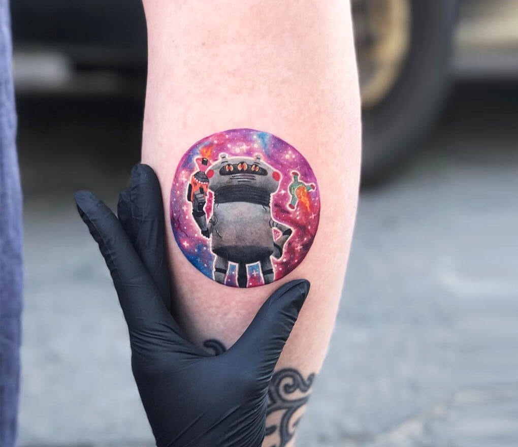 Ericksen Linn Tattoo - Who doesn't live toy robots? Also, I am giving  discounts to people who book flights to get tattooed by me, please include  this in your email when you
