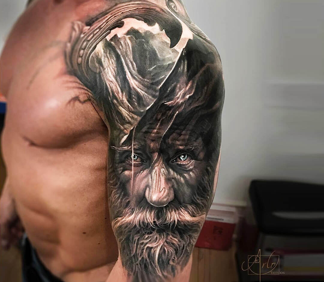 Old man face tattoo by Arlo Tattoos