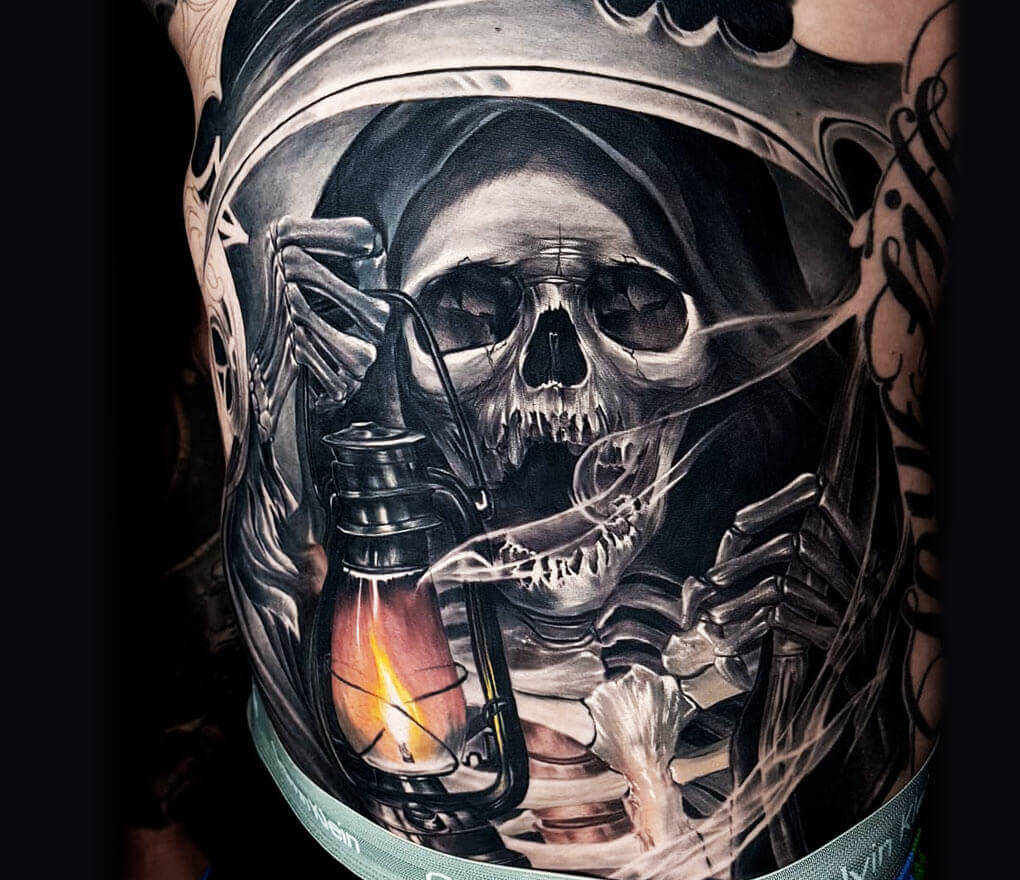 grim reaper with wings tattoo
