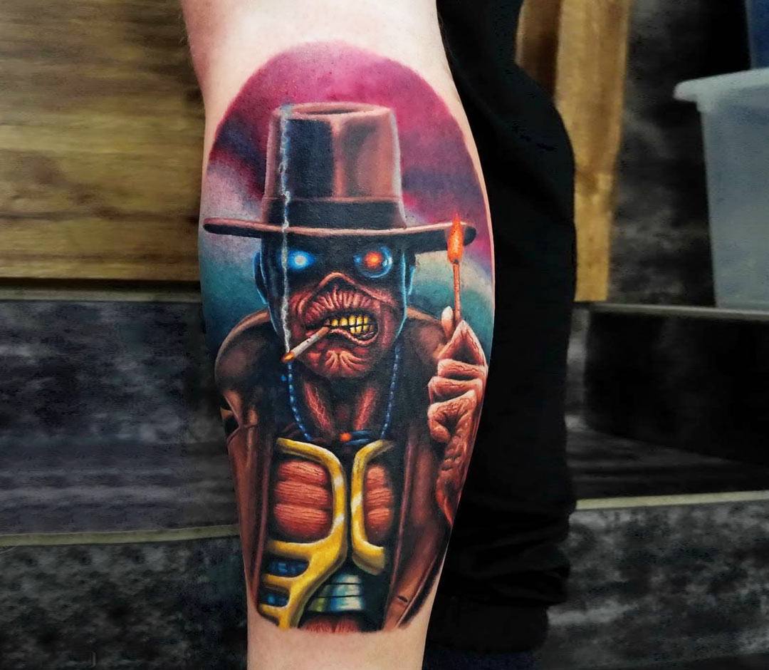 My Eddie tattoo a couple years healed. Thinking about adding some color to  it, I'm thinking puke yellow and mold green 🤔 : r/ironmaiden