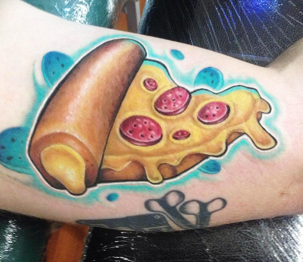 A tattoo of earth as a large cheese pizza, on someones | Stable Diffusion