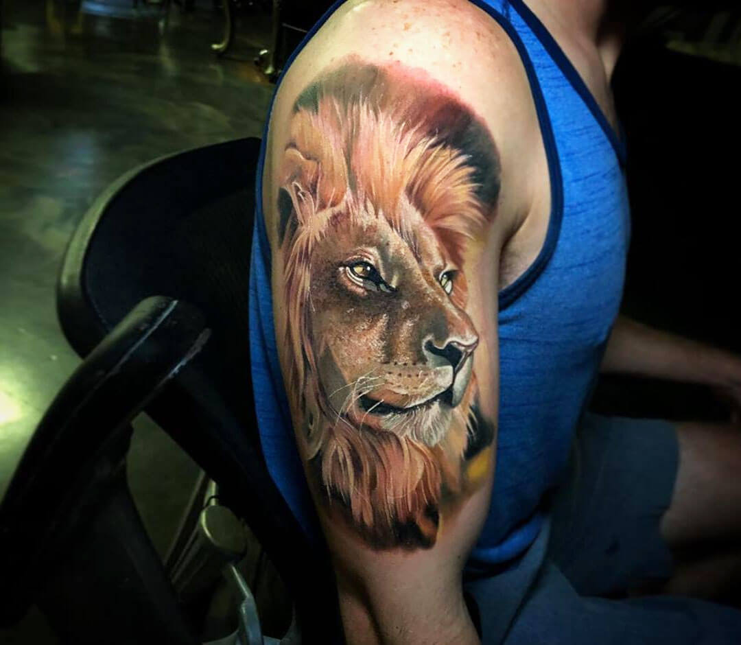 Lion tattooed on the arm with a stripe of color done by @edicontreras_ |  www.otziapp.com | Lion hand tattoo, Lion head tattoos, Back of hand tattoos