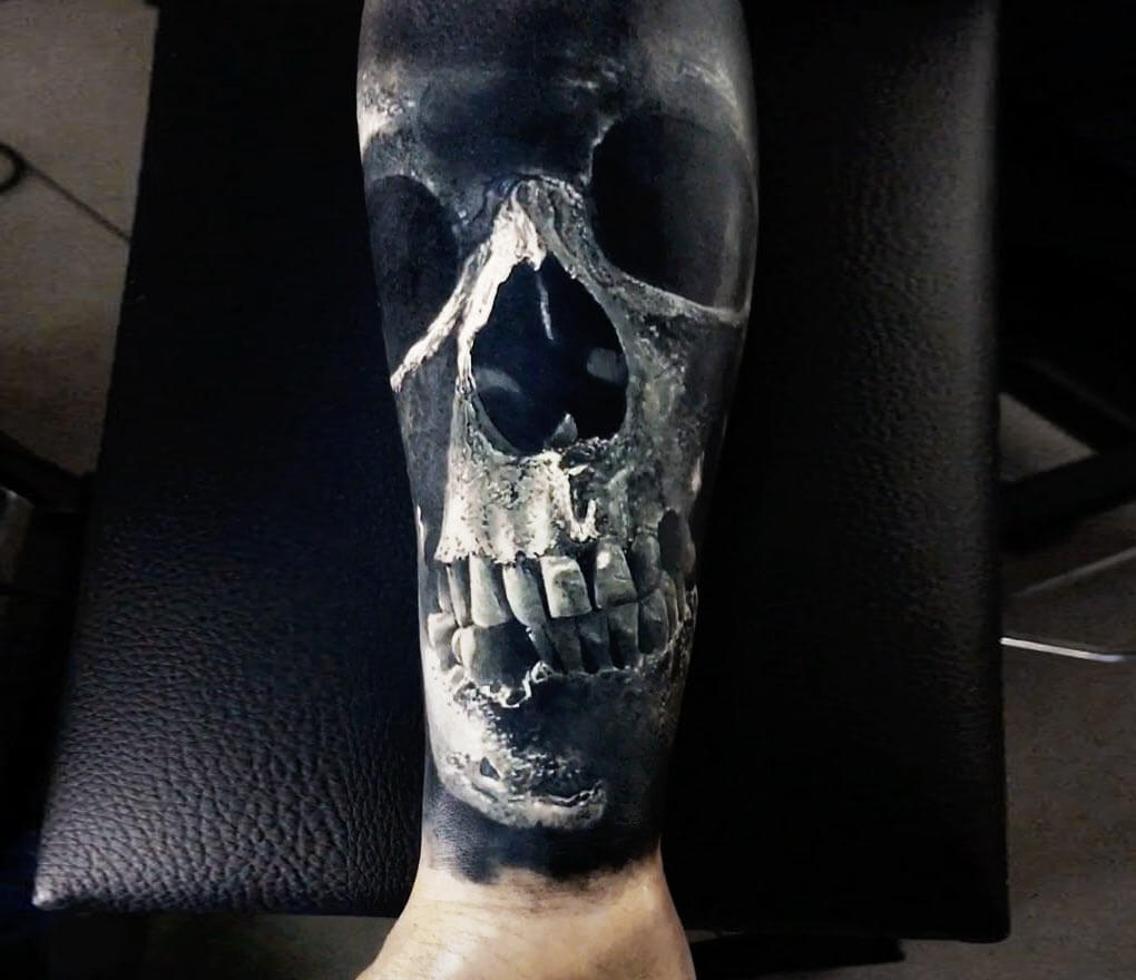 Tattoo And Skull - Melting black skull tattoo on the wrist. | Facebook