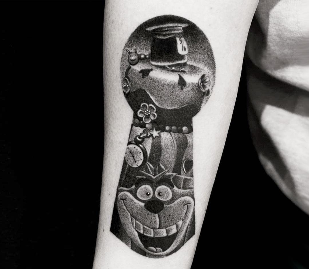 Micro-realistic key and keyhole tattoo done on the