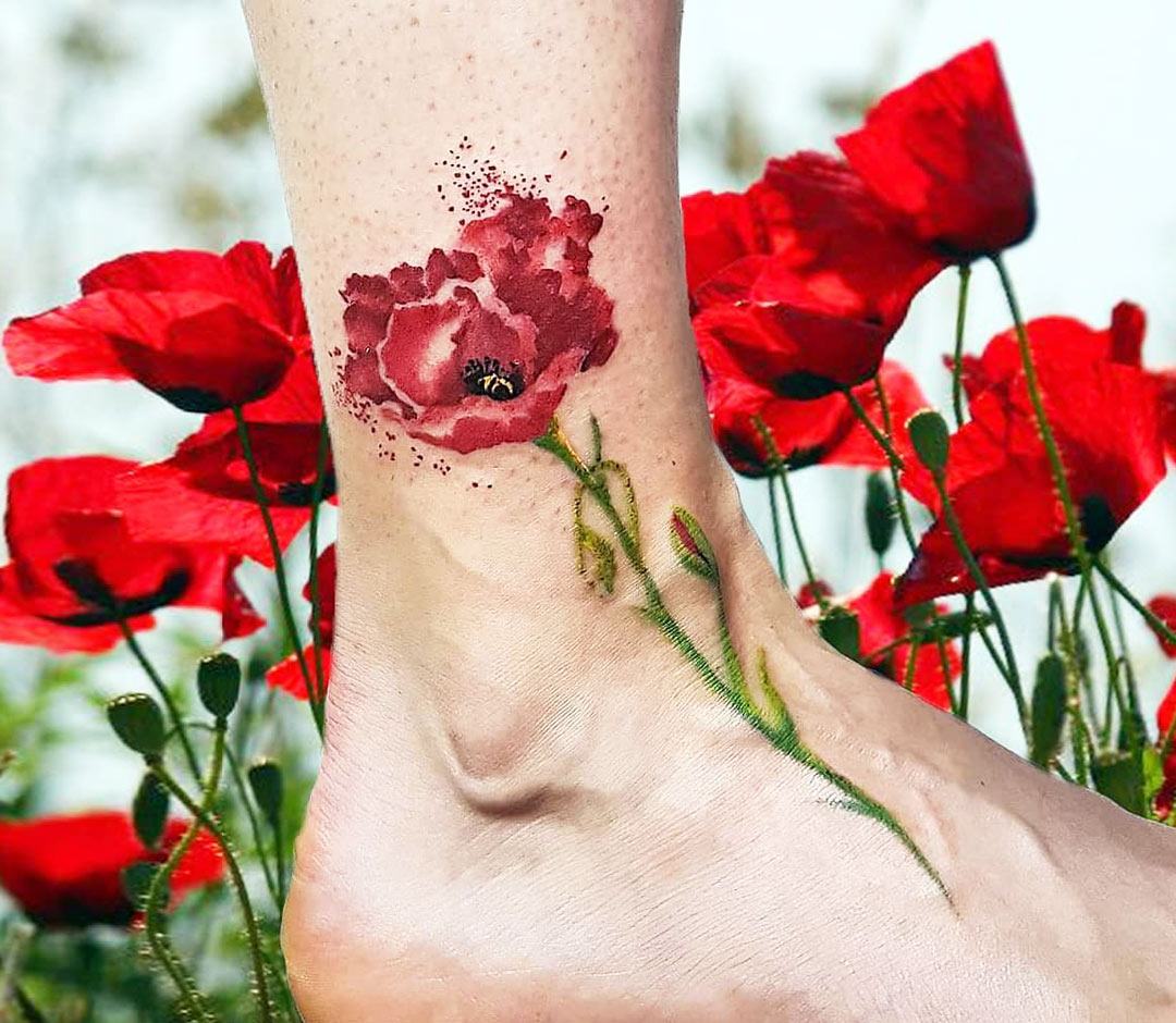 Tattoo uploaded by Lindsey Walton • Poppy #poppy #flower #watercolor #back # tattoo #spineline #pink #lovely #unknownartist • Tattoodo
