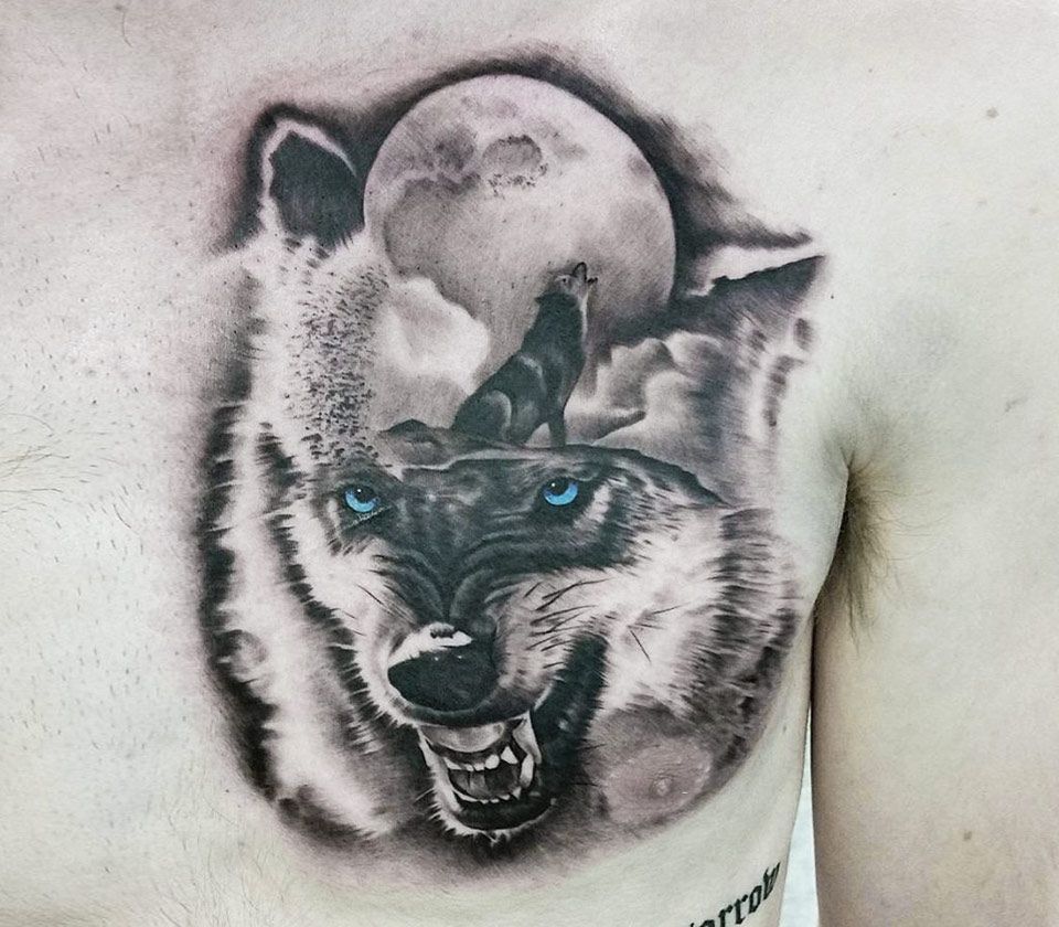 Microrealistic wolf tattoo located on the upper arm