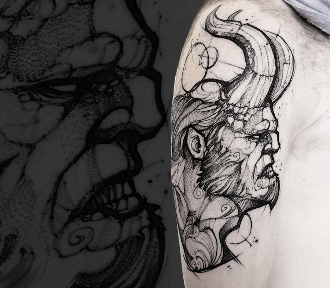 Hellboy tattoo located on the thigh.