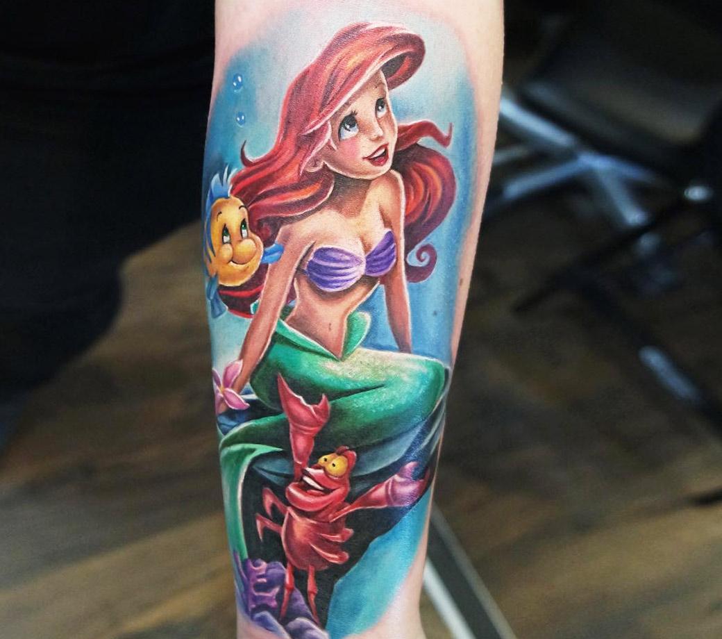 Ariel the little mermaid tattoo on the left side