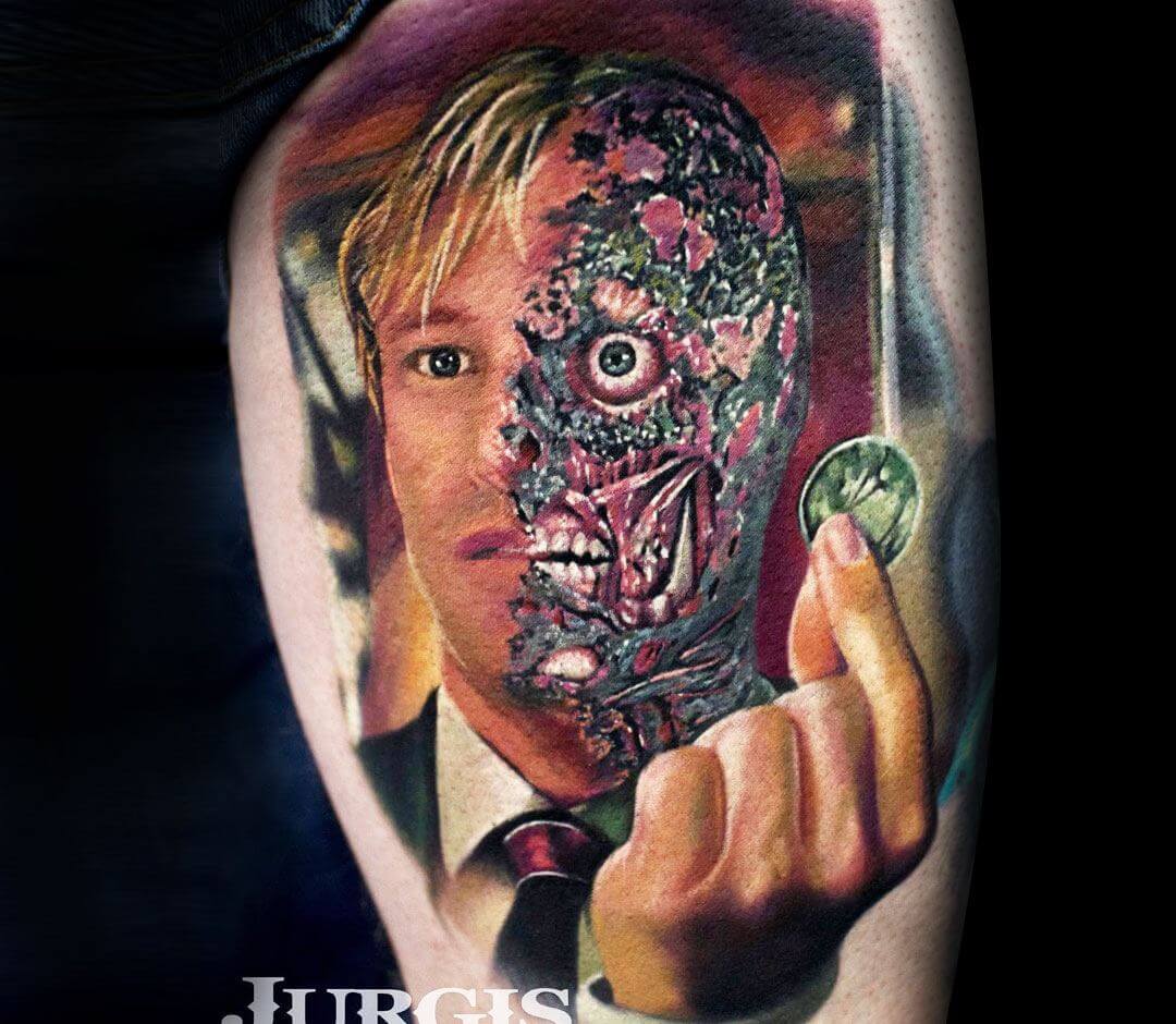 Two Face tattoo by Jurgis Mikalauskas. 