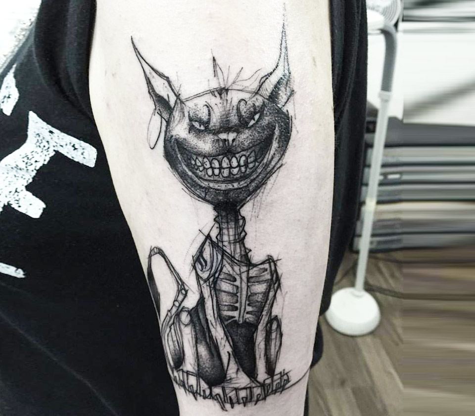 Mad Cat tattoo by Kamil Mokot. 