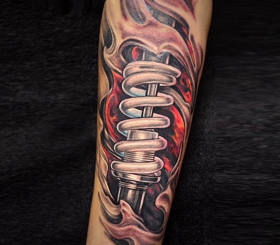 Ink Addiction Tattoo Doncaster - Metallic shock absorber skinrip cover up  tattooed on the outer calf by Tony. | Facebook