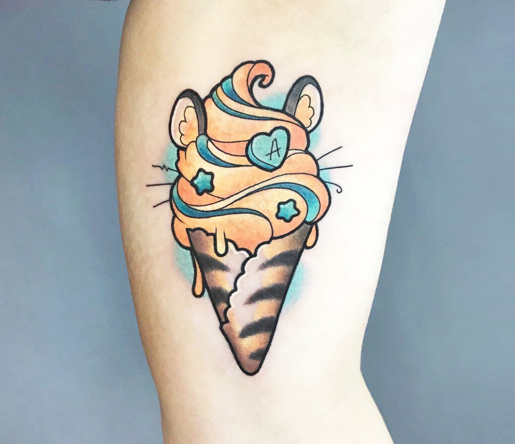 Ice cream tattoo on the inner arm.