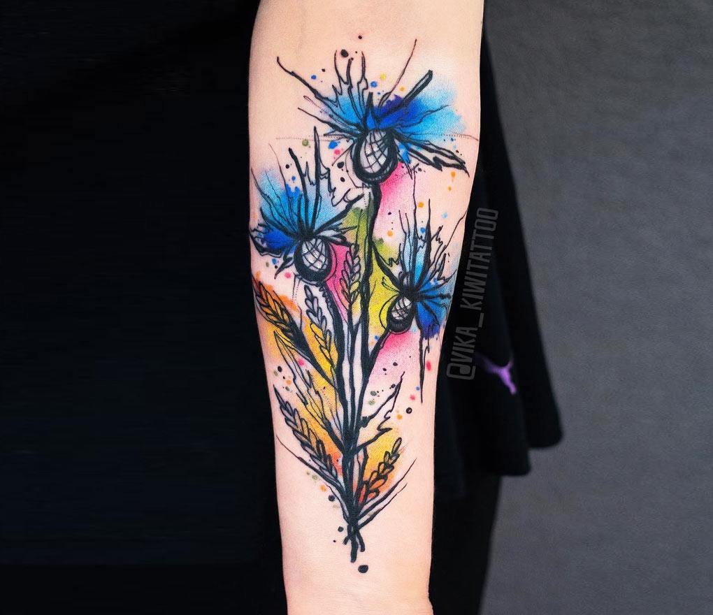 Cornflower tattoo by Kiwi Tattoo