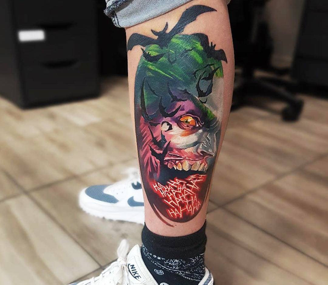 Tattoo of batman and the joker on a full arm on Craiyon