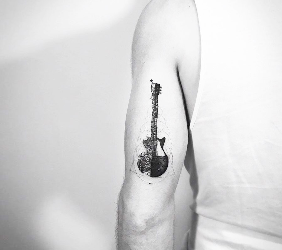 Minimal Guitar Tattoo | Guitar tattoo, Music tattoo designs, Music tattoos