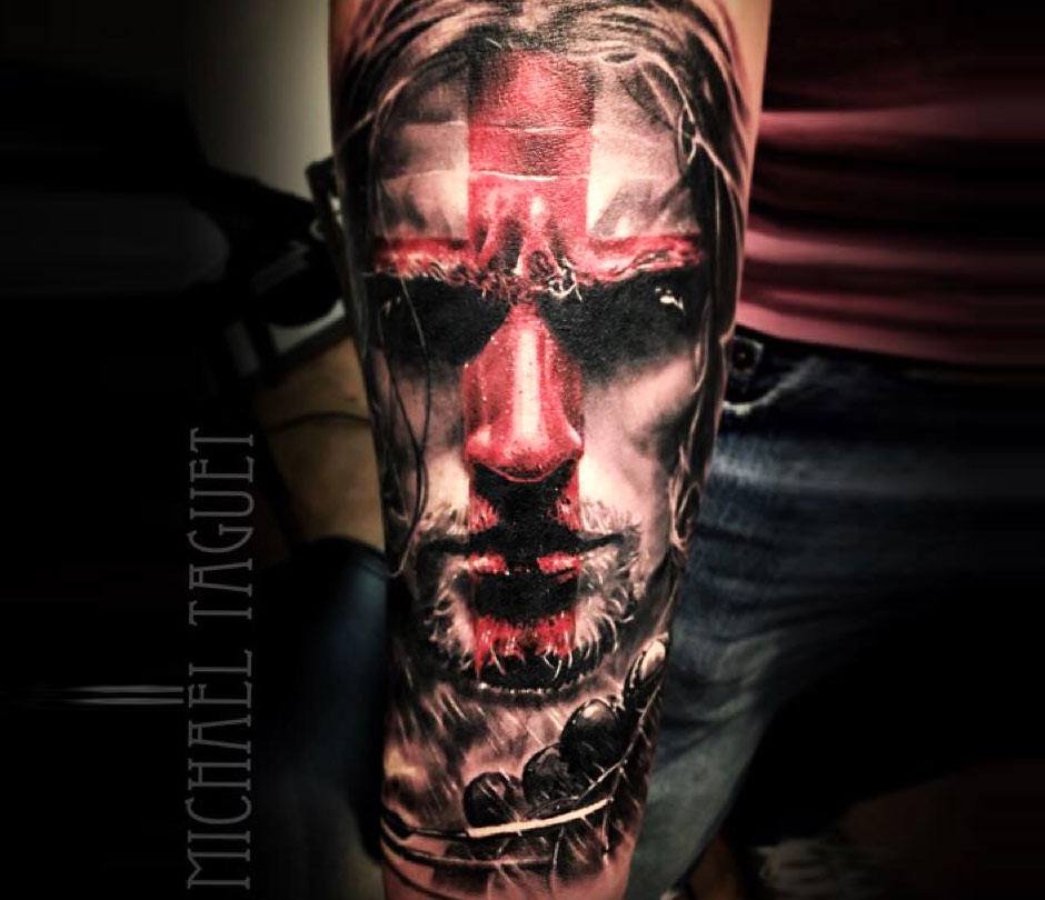 Man face with cross tattoo by Michael Taguet Photo 21086