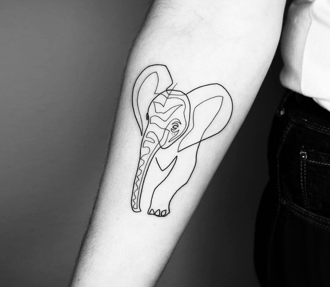 Little Tattoos  Tiny fine line style elephant tattoo on the left