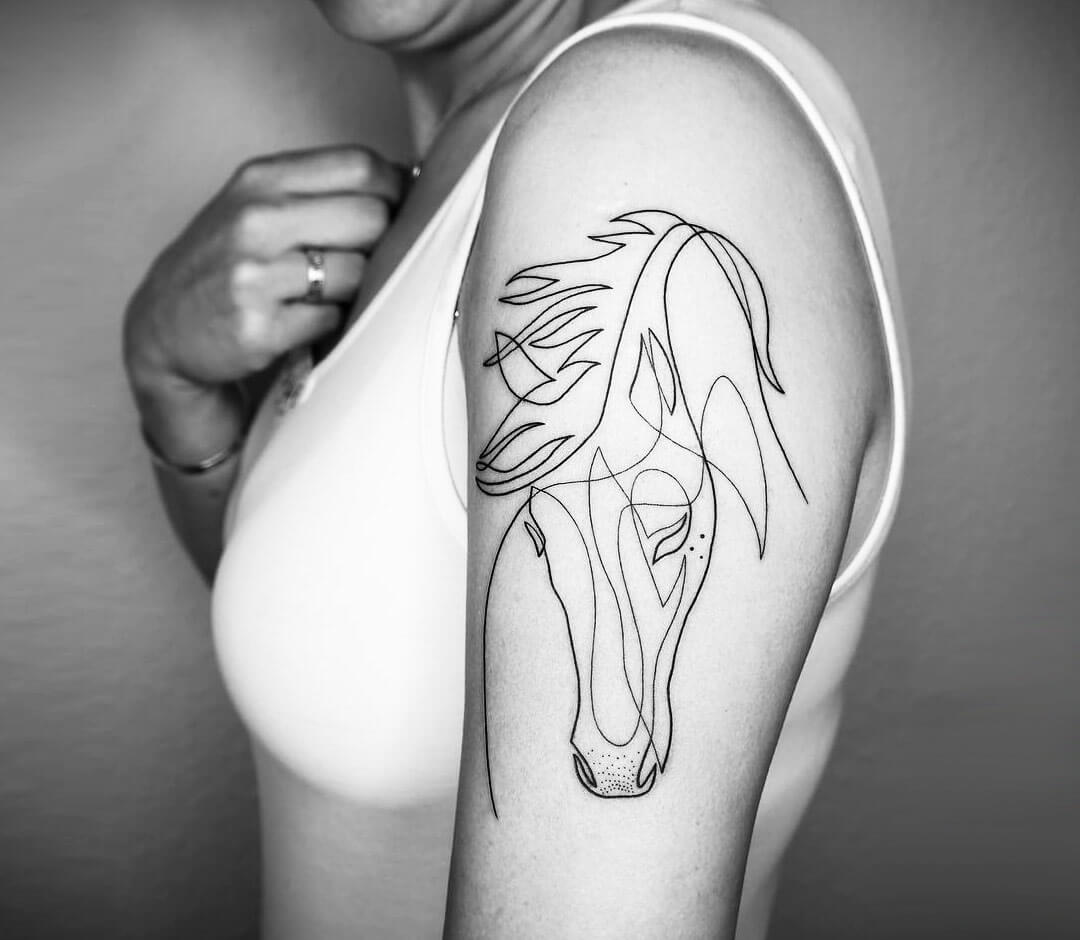 Premium Photo | Tattoo of a horse with a cloud on the back