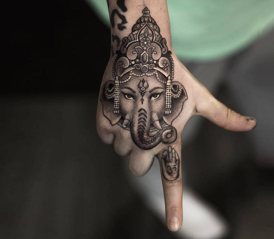 Ganesha Tattoo Design Ideas Images | Band tattoo designs, Subtle tattoos, Ganesh  tattoo