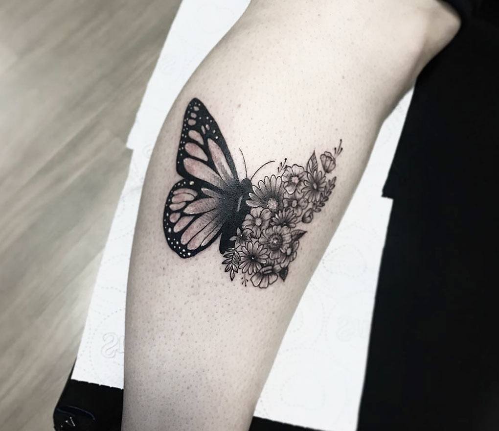 monarch butterfly on flower tattoo