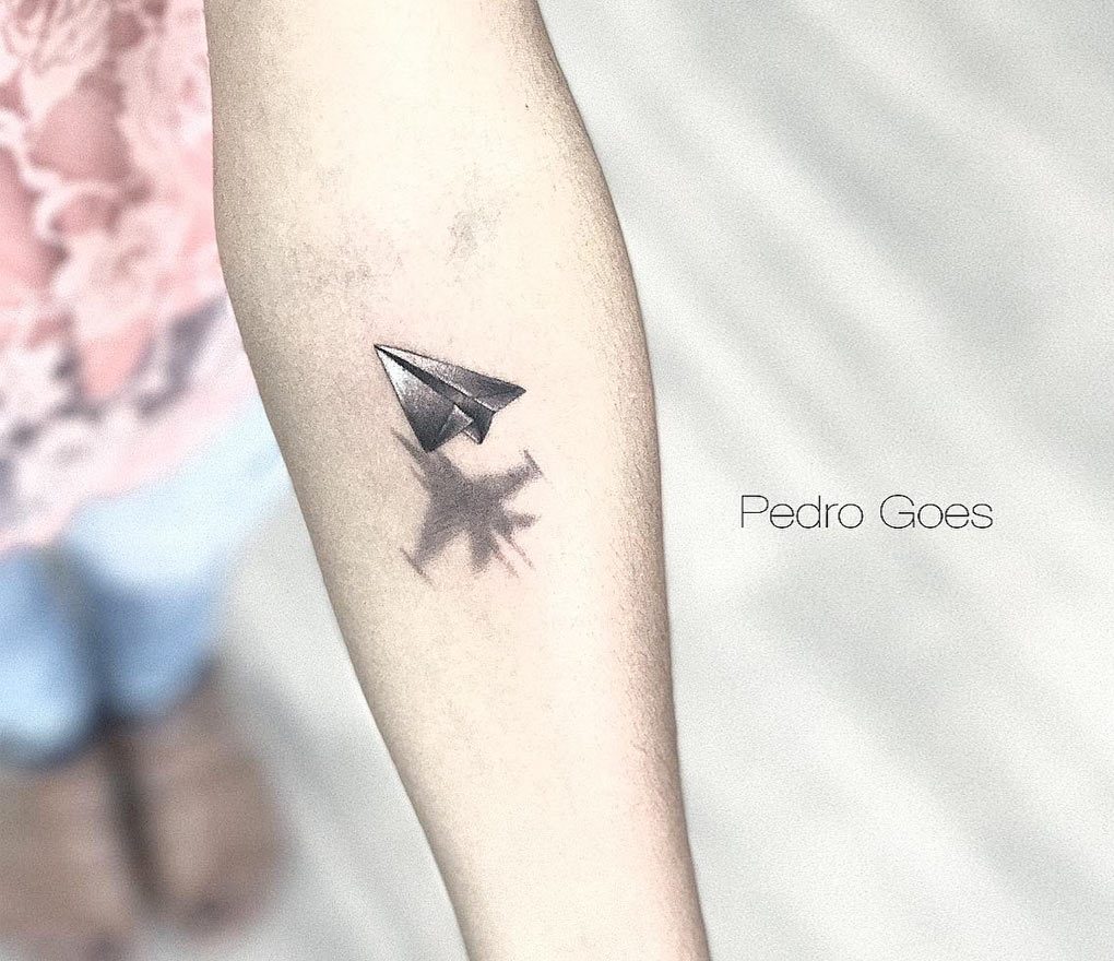 Minimalist Airplane Tattoo on the Ankle by zitae