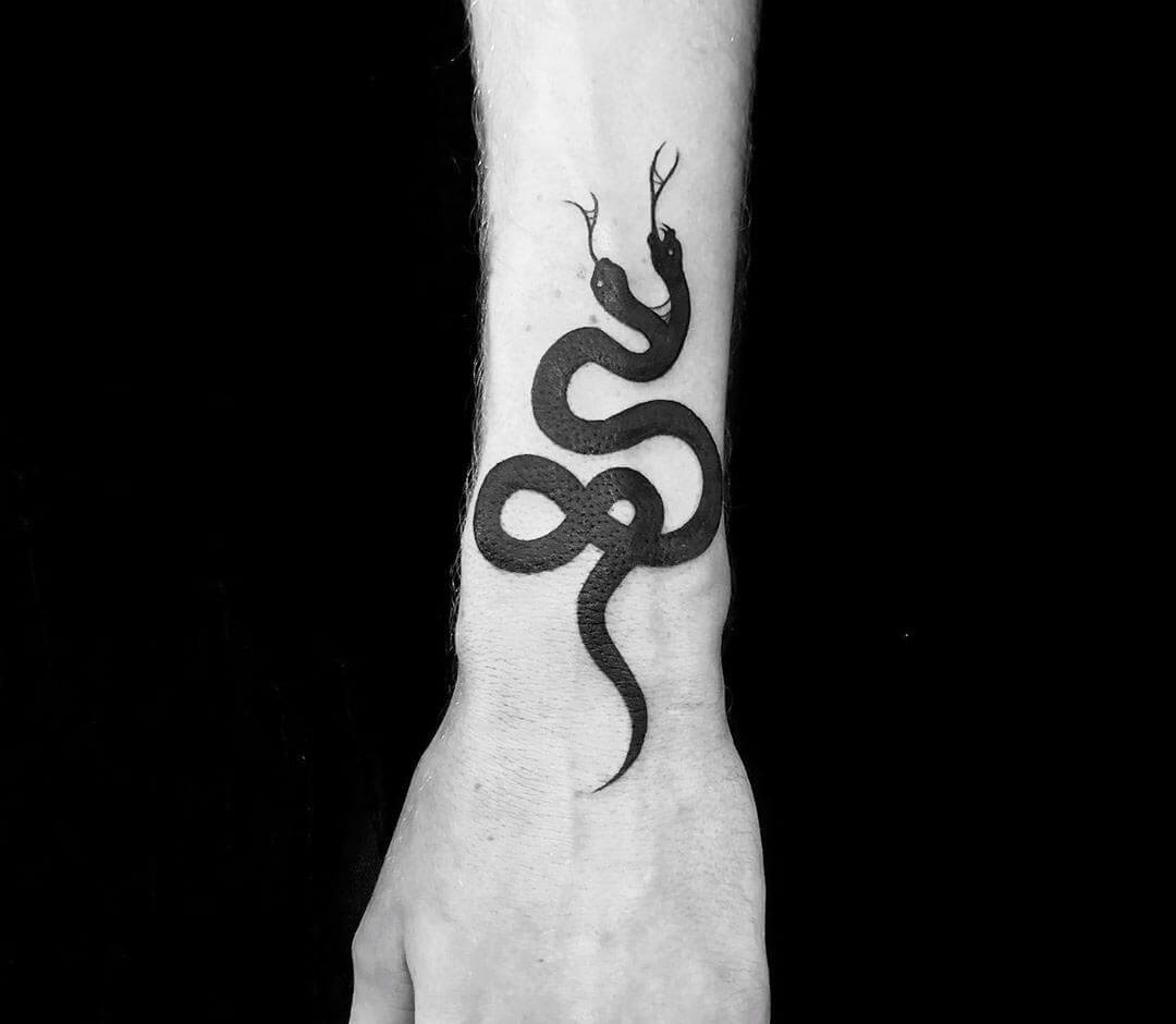 Tattoo photos Gallery. contemporary two head snake tattoo art Roy Tsour. 