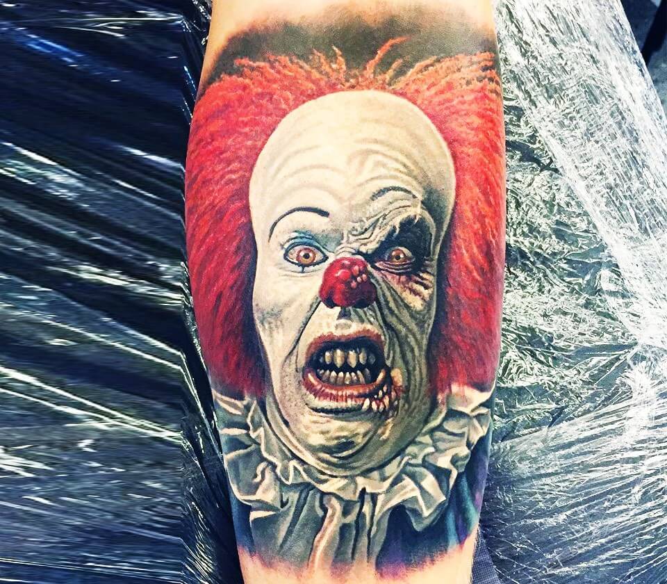 Creepy Clown Tattoo with Red Balloon