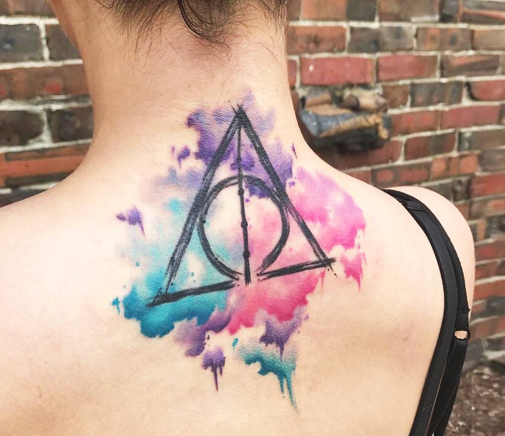 Tattoo uploaded by Stacie Mayer  Deathly Hallows symbol by June Jung  watercolor brushstroke HarryPotter DeathlyHallows JuneJung  Tattoodo
