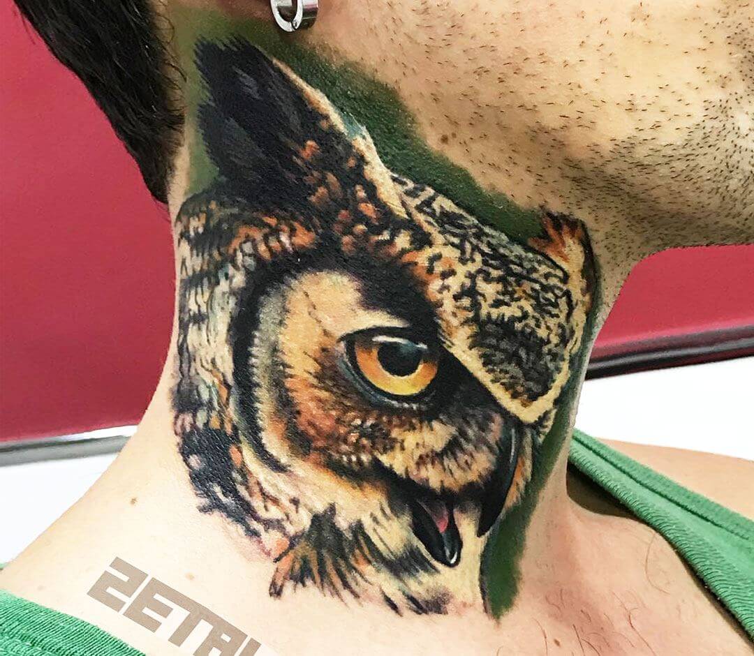Owl On Neck Tattoo