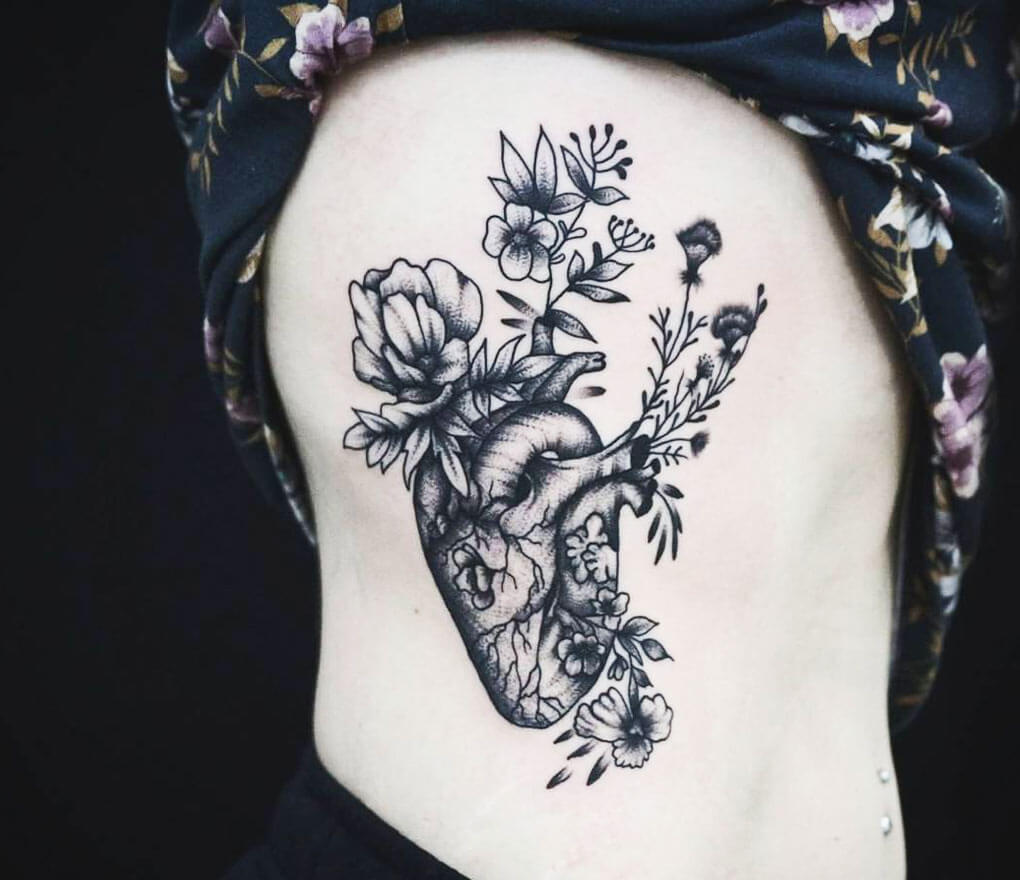 Anatomical heart with birth flowers tattoo tattoos ink  blackandgreytattoo blackwork whipshading flowers floraltattoo   Instagram